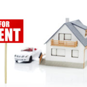 Model house and car with for rent sign on white background