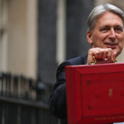 British Chancellor of the Exchequer Philip Hammond poses for pictures with the Budget Box as he leaves 11 Downing Street in London, on October 29, 2018, before presenting the government's annual Autumn budget to Parliament. - Chancellor of the Exchequer, Hammond will try to navigate a political minefield when he unveils a budget that could be scuppered by the final terms of Brexit next year. (Photo by Daniel LEAL-OLIVAS / AFP)        (Photo credit should read DANIEL LEAL-OLIVAS/AFP/Getty Images)