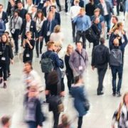 business people crowd at a tradeshow, banner size. ideal for websites and magazines layouts